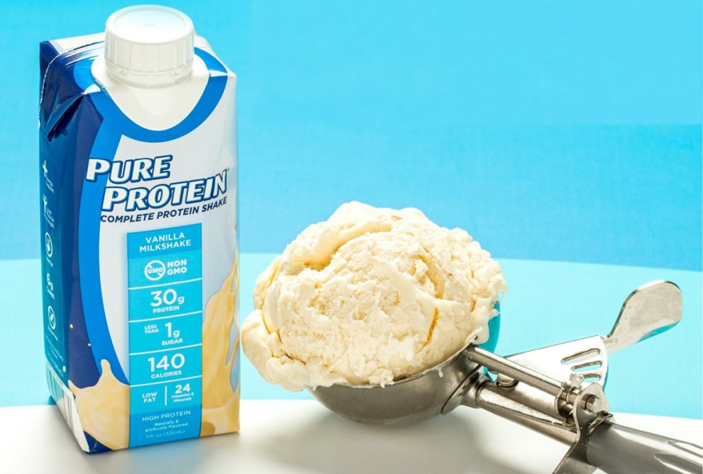 bottled vanilla milkshake protein shake and ice cream scoop with vanilla ice cream