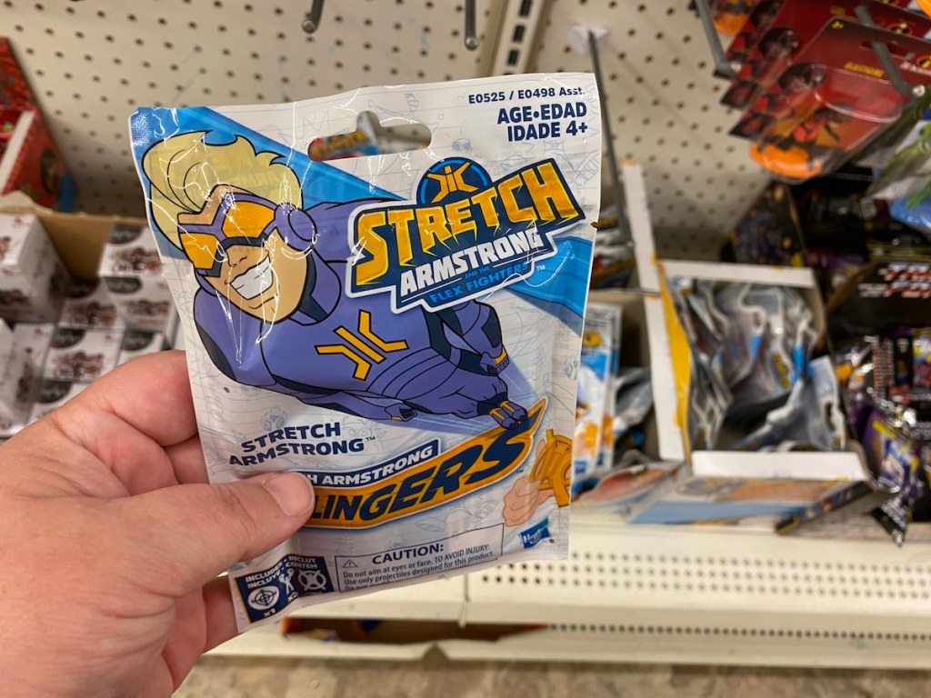 hand holding stretch armstrong flingers