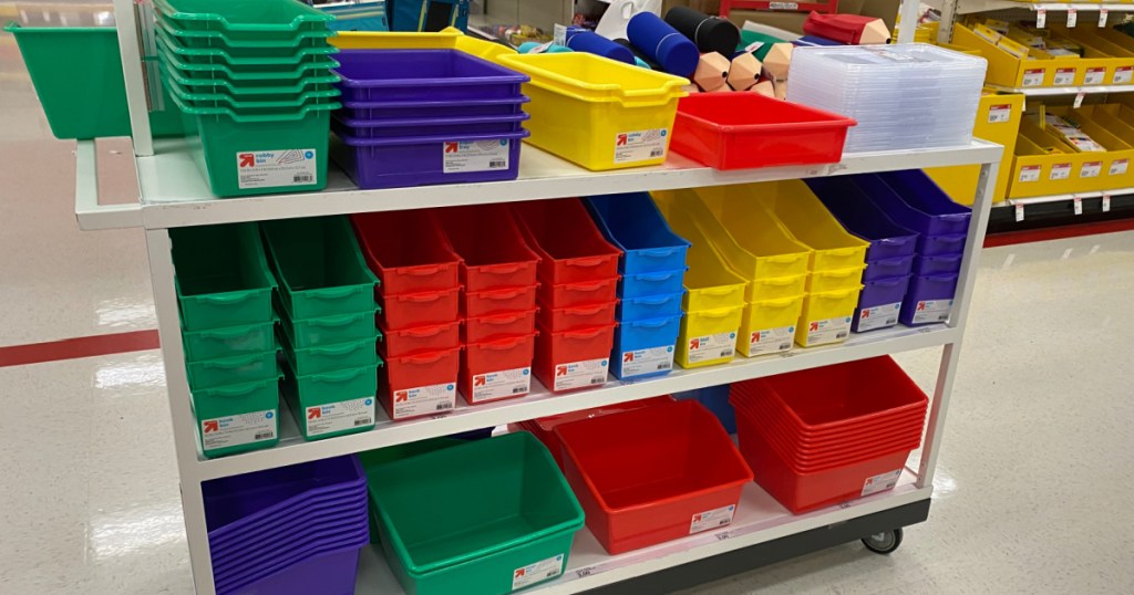 various colorful school supplies on shelves in store