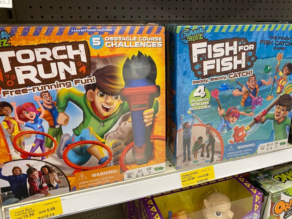 Torch Run and Fish Strike Board Games sitting on target store shelf