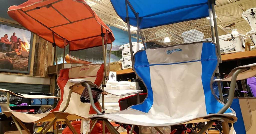 canopy chair with cup holder in red and blue on display in store