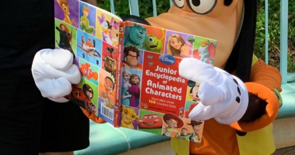 goofy holding a book of Disney characters