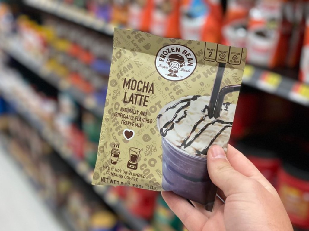 hand holding Mocha Latte pouch at store