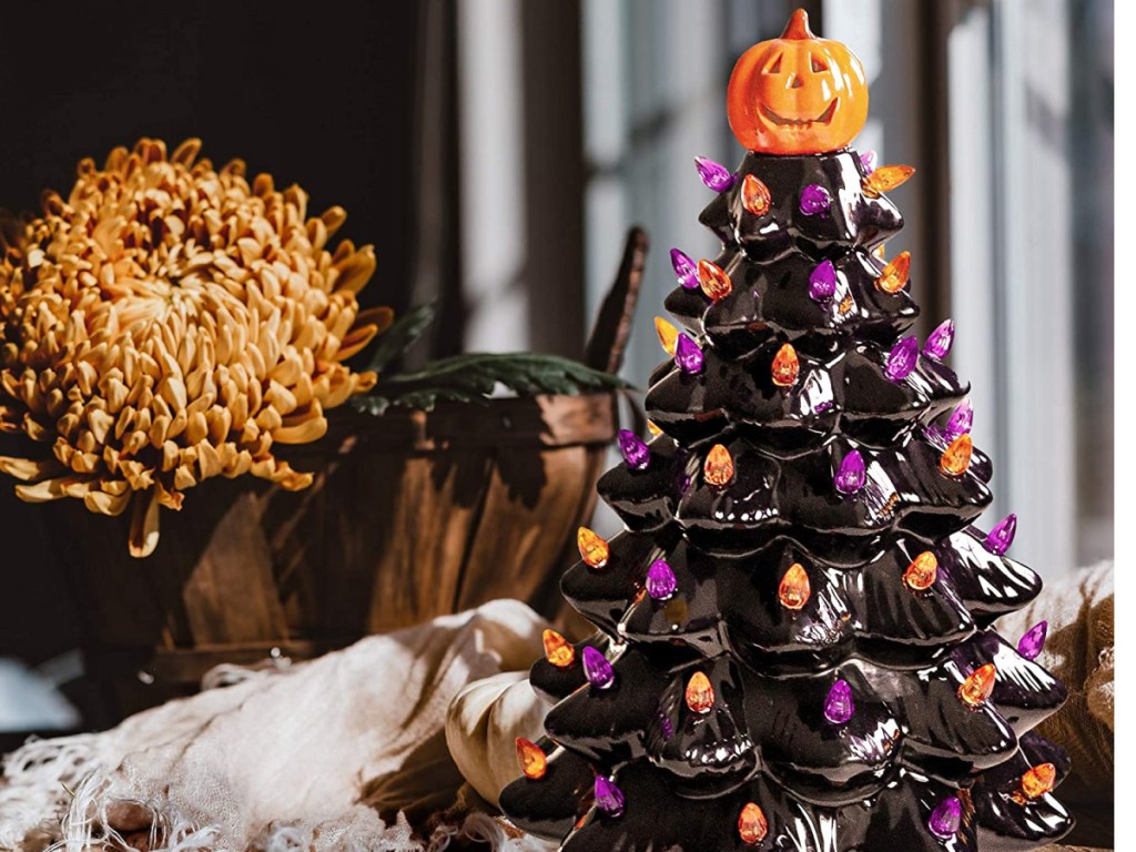 table top decor with ceramic black tree on it