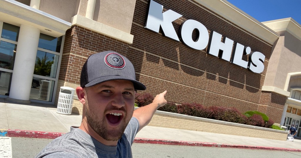 man taking selfie in front of kohl's store