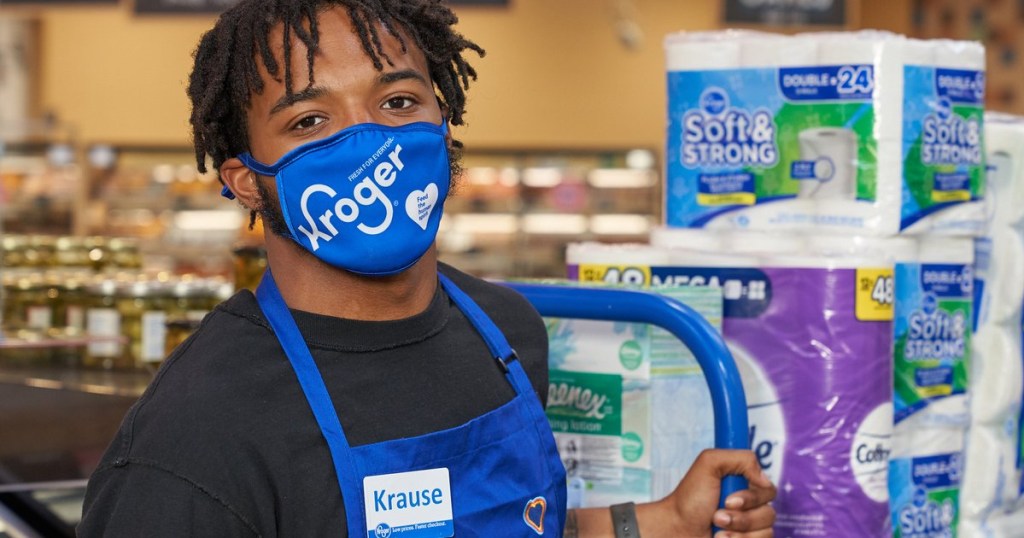 kroger employee wearing a blue face mask