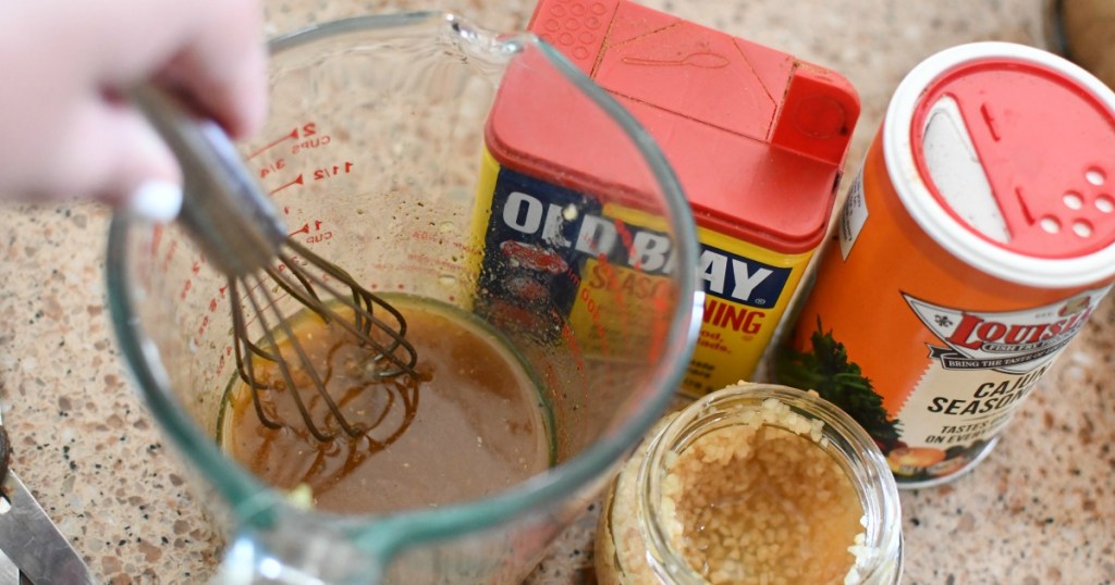 making a seasoned butter sauce for shrimp boil