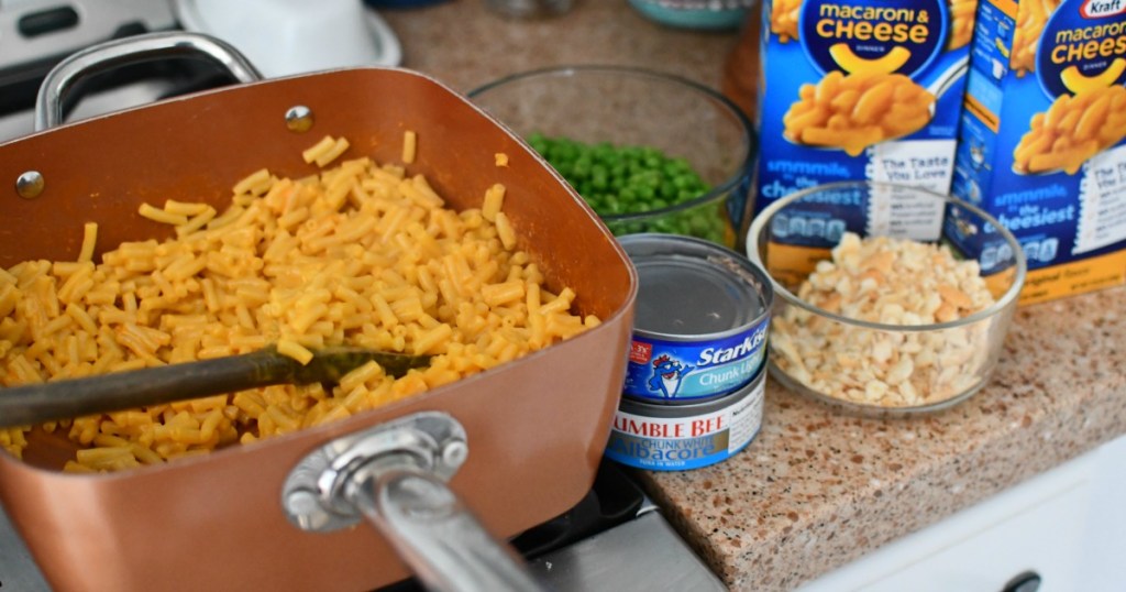 making tuna noodle macaroni on the stove