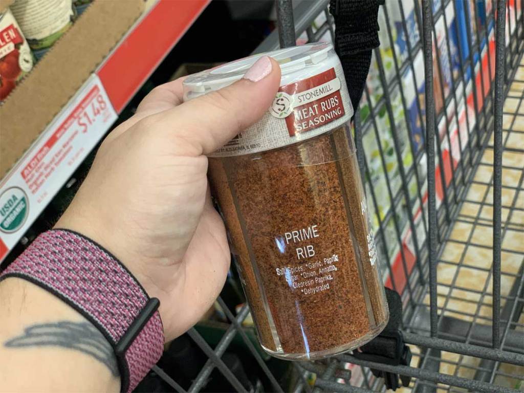 hand holding meat rubs seasonings