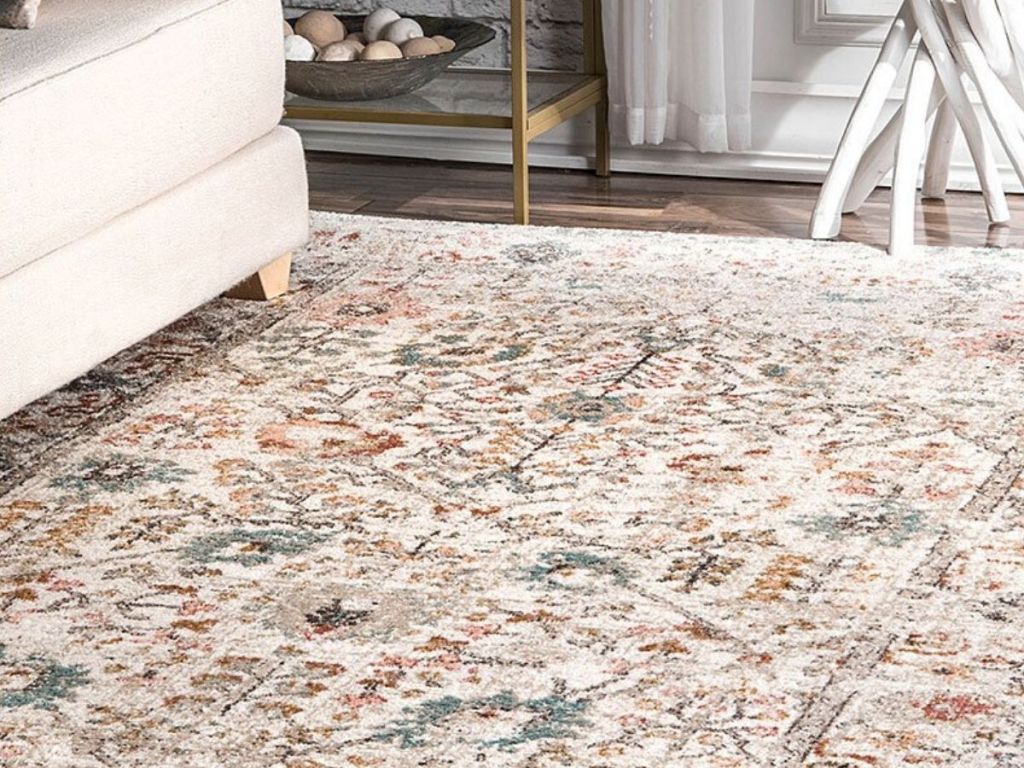 area rug with couch and small table