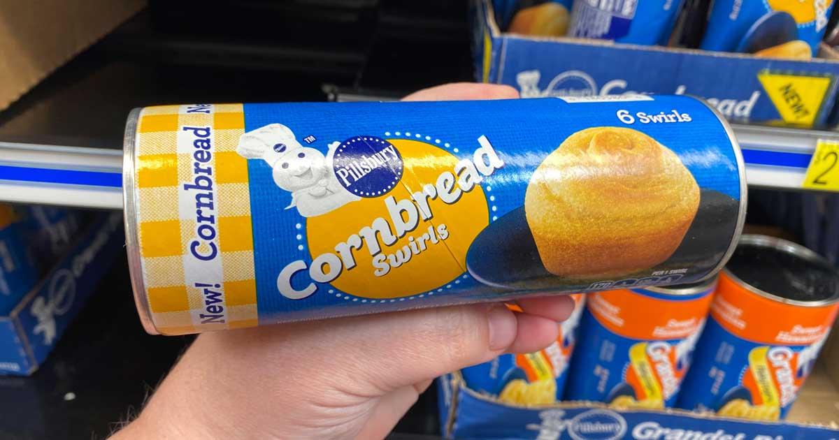 hand holding a can of cornbread swirls
