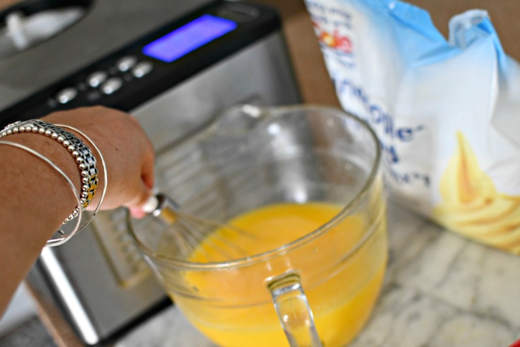 whisking together dole whip for ice cream maker