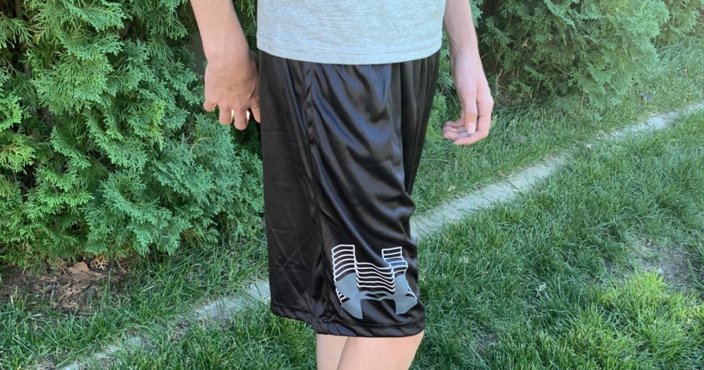 under armour boys prototype shorts in grass