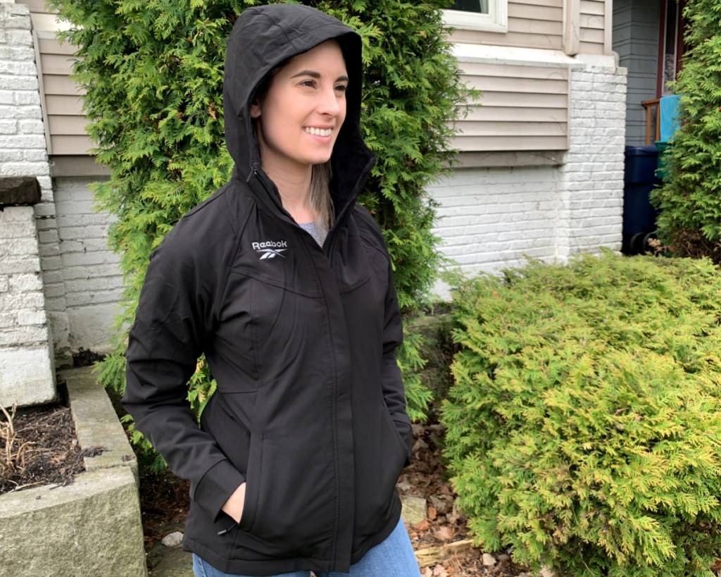 reebok womans jacket on woman outside