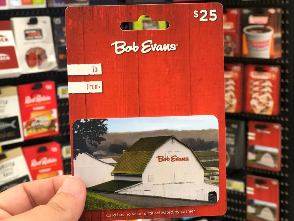 hand holding $25 Bob Evans gift cad