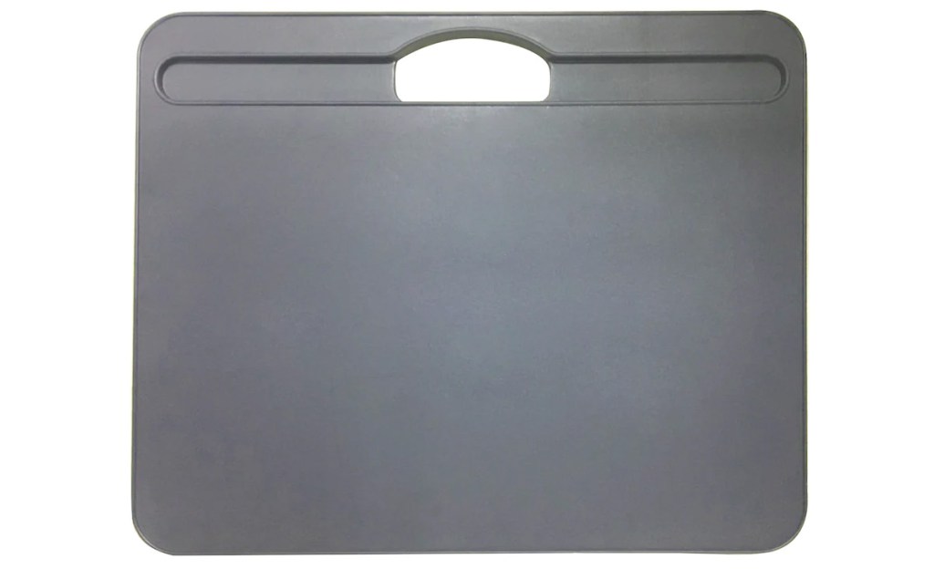 rectangular grey lap desk with carrying handle and indentation to hold pencils at the top