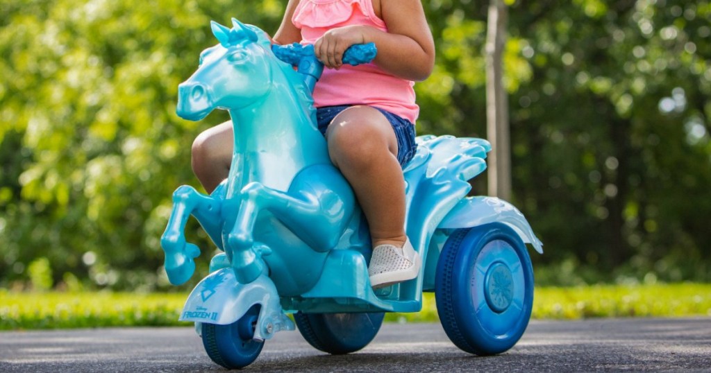 girl riding Frozen 2 Nokk Ride-on