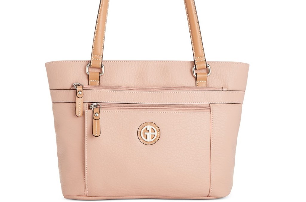 pink handbag with GB monogram on front