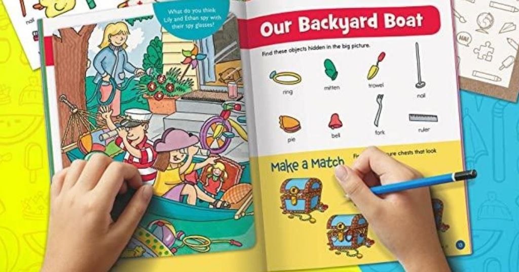 child using learning workbook