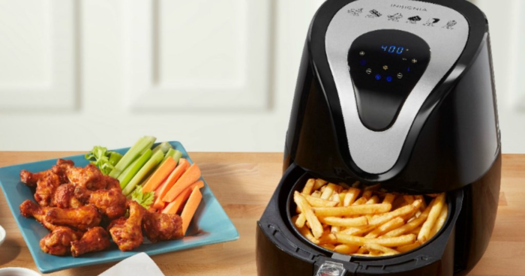 air fryer and plate of fried foods