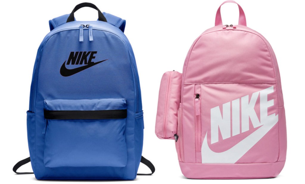 blue backpack with black nike logo on front and pink backpack with white nike logo on front