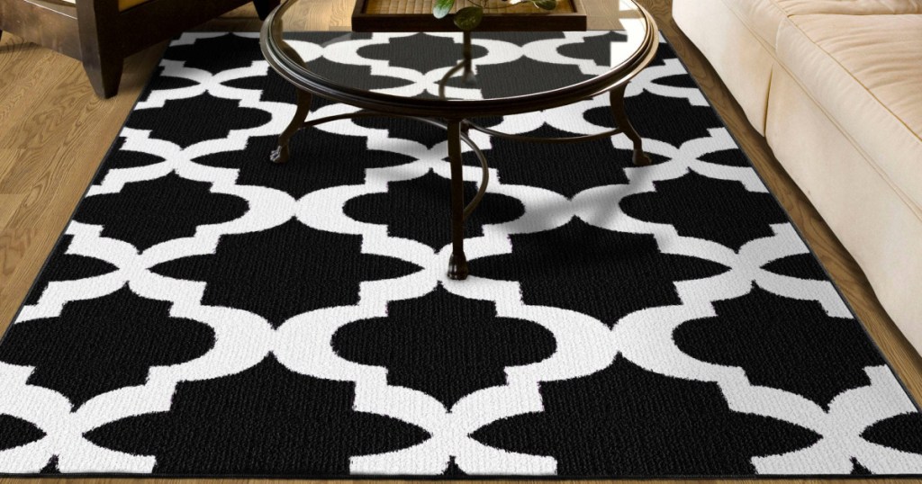 black and white geometric area rug in living room