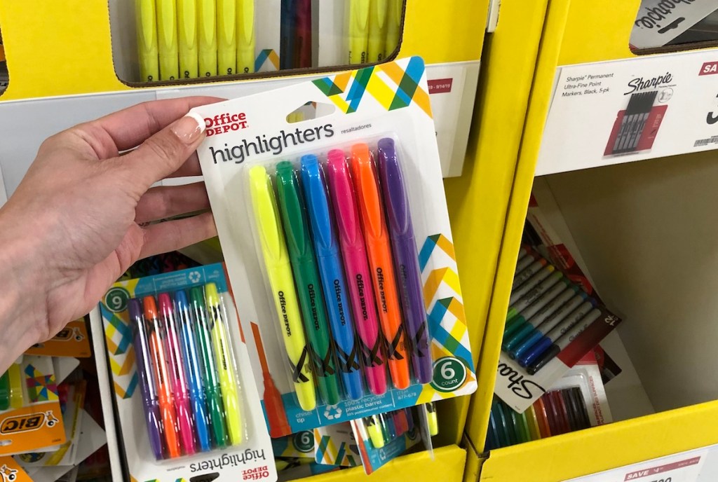 hand holding package of Office Depot Highlighters