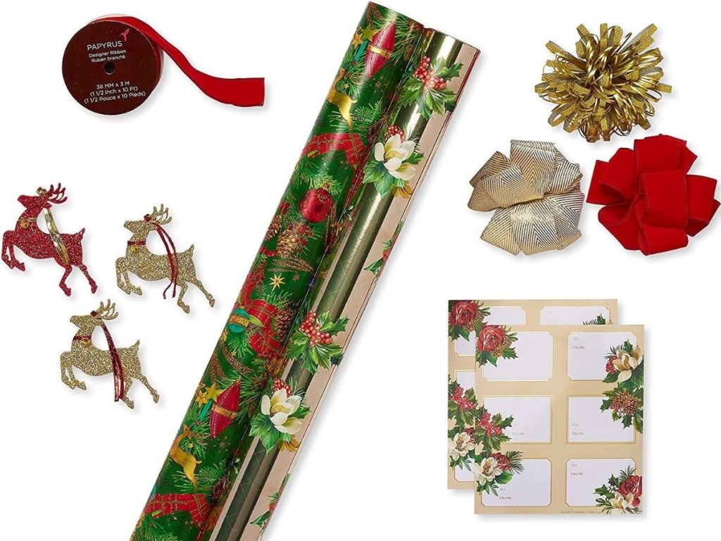 gift wrap kit with two rolls of wrappingpaper, bows, ribbon, tags and reindeer decorations