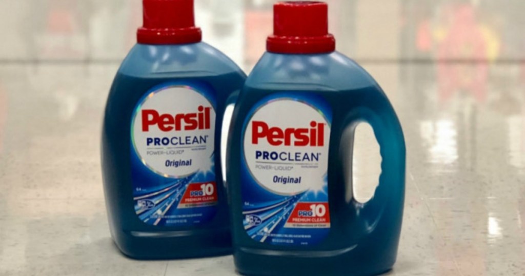 two bottles of persil on floor