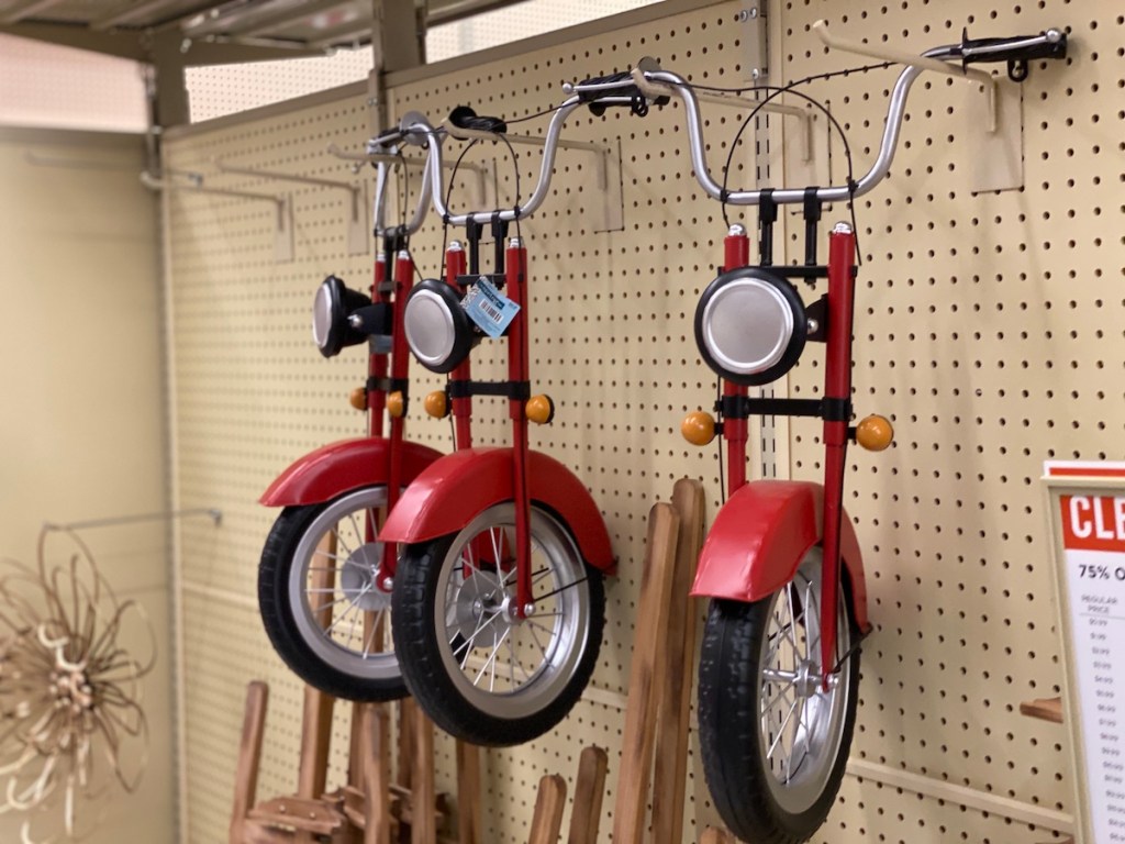 red motorcycle wall decor hanging on display