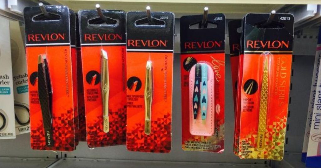packs of revlon tweezers hanging