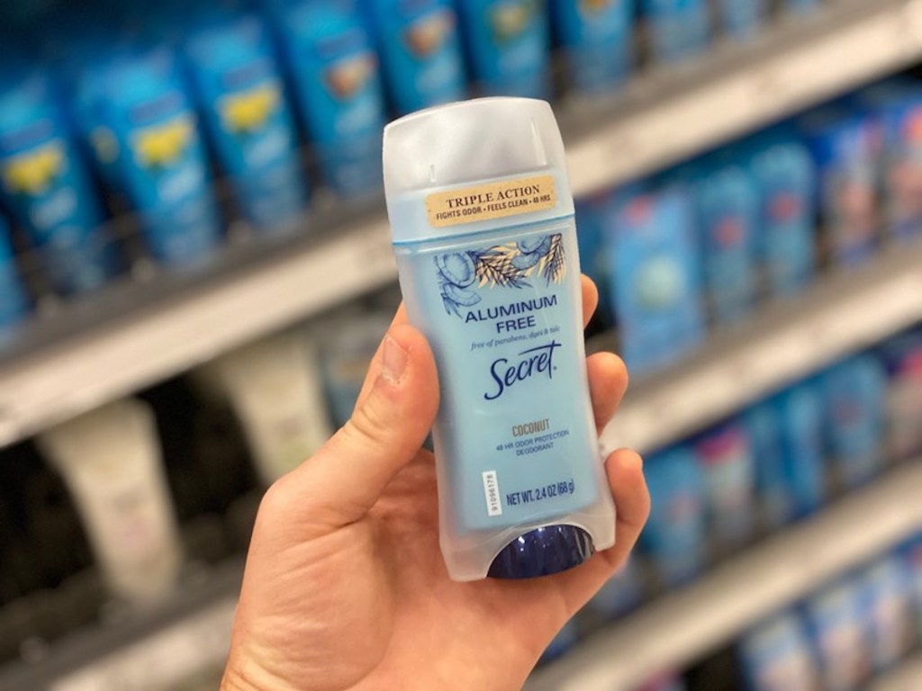 hand holding blue Secret Aluminum Free Deodorant at target