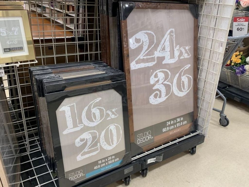 large picture frames on store shelf 
