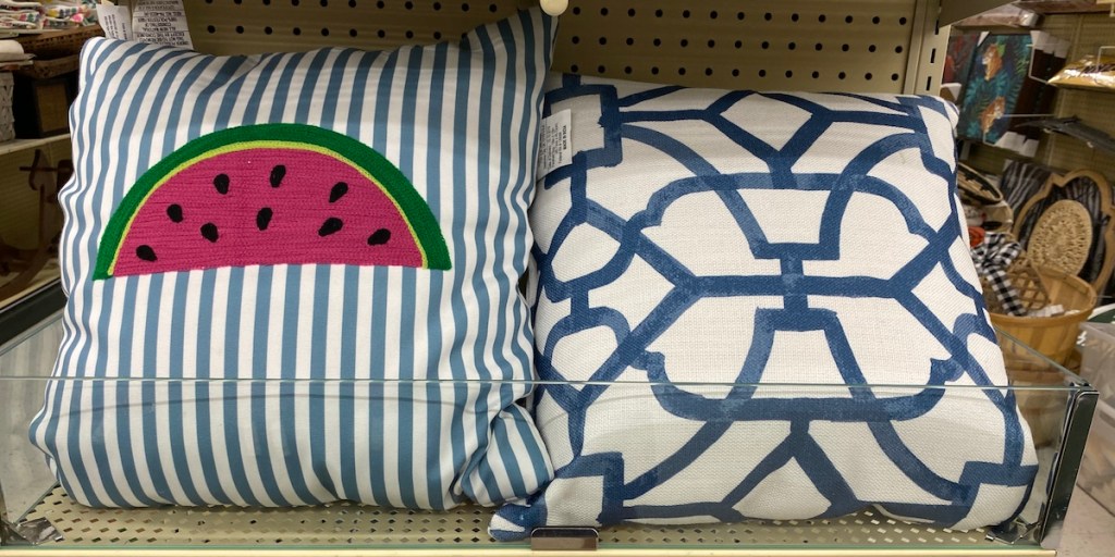 two pillows on shelf at Hobby Lobby