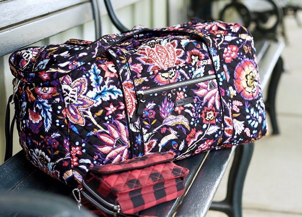 Vera Bradley Large Travel Duffel Bag in Foxwood on park bench