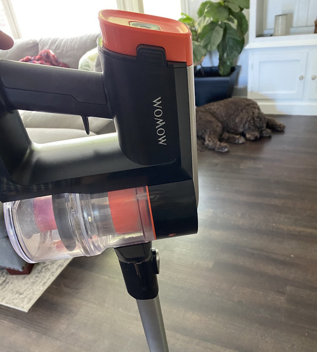 box of Womow Cordless Vacuum Cleaner out of box on hardwood floor
