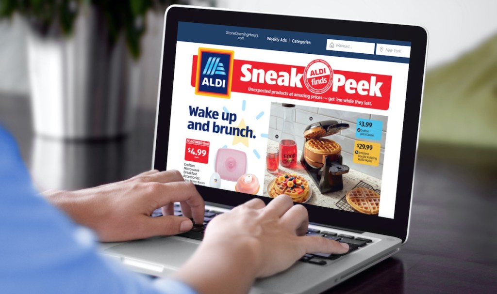 person typing on laptop with aldi sneak peek on screen