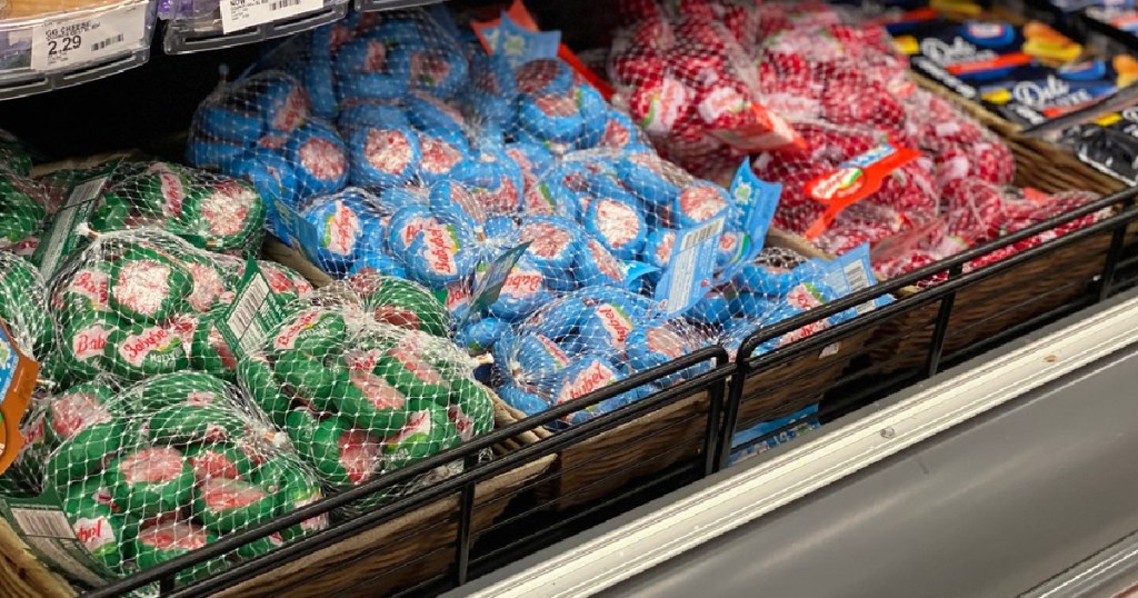 store shelf with packages of cheese