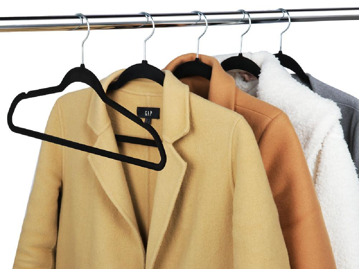 black velvet hangings holding thick coats