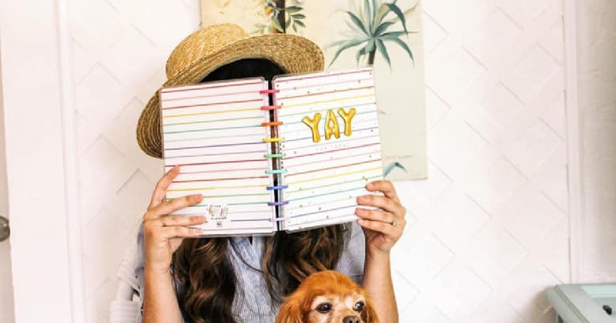 woman looking at a dated planner