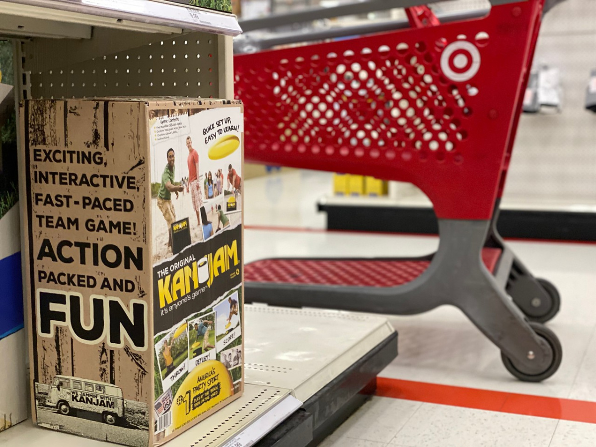grocery cart next to aisle with boxed game
