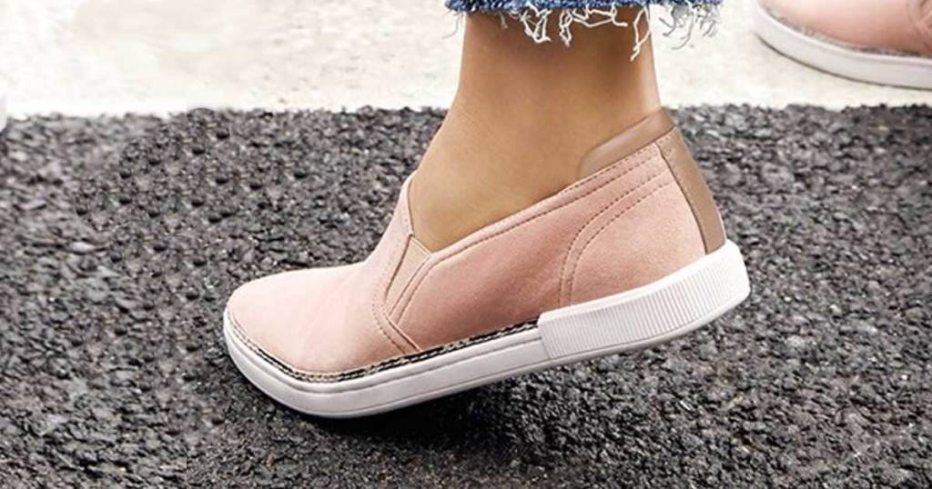 woman wearing a naturalizer dusty rose sneaker