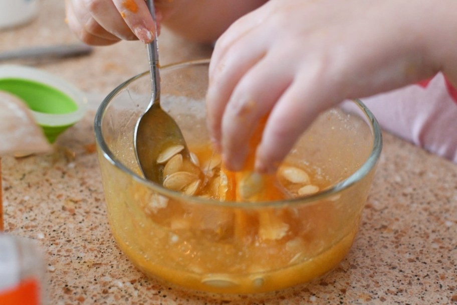 stirring pumpkin guts slime