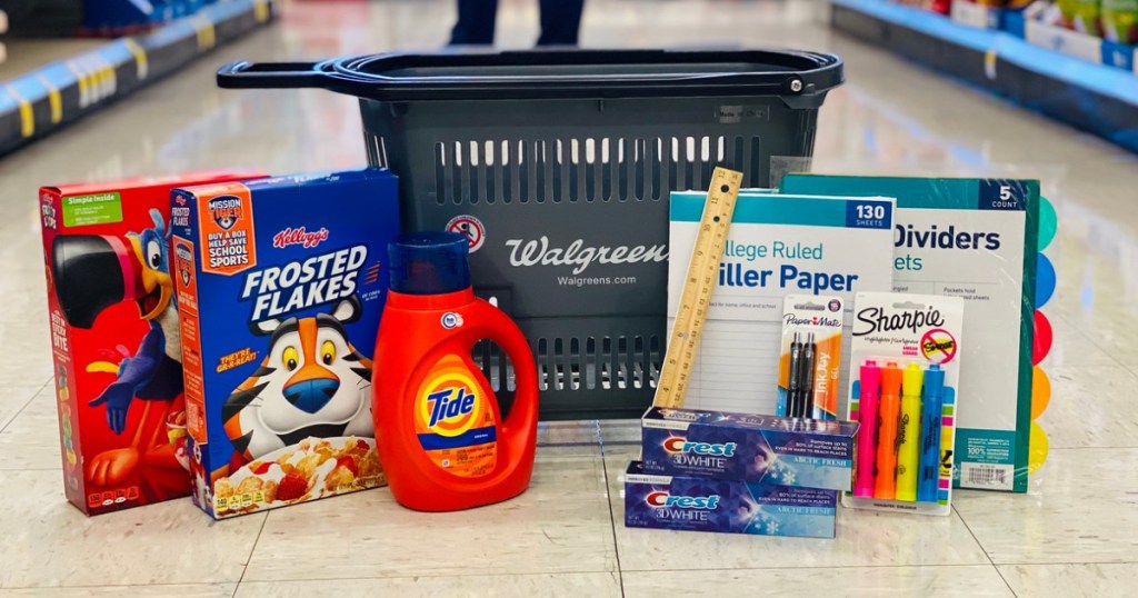 store carry basket with detergent, cereal and school supplies stacked around it