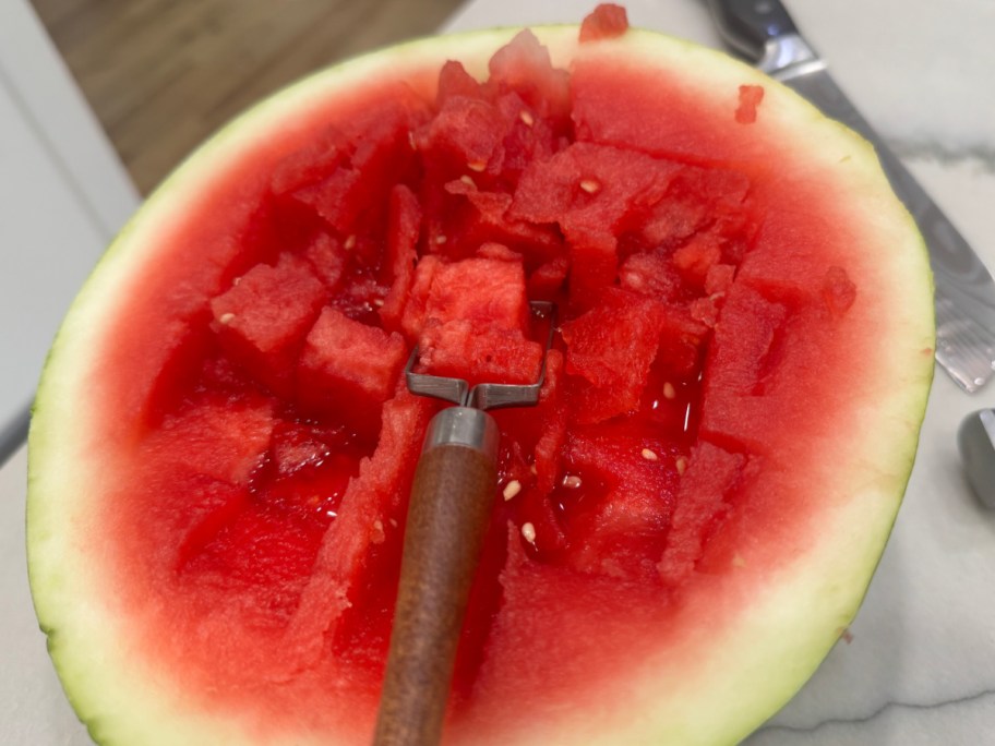 watermelon wooden tool with cube shape on end