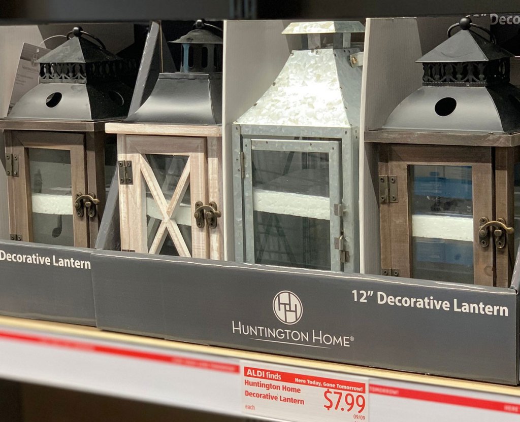 metal and wood decorative lanterns on ALDI store shelf