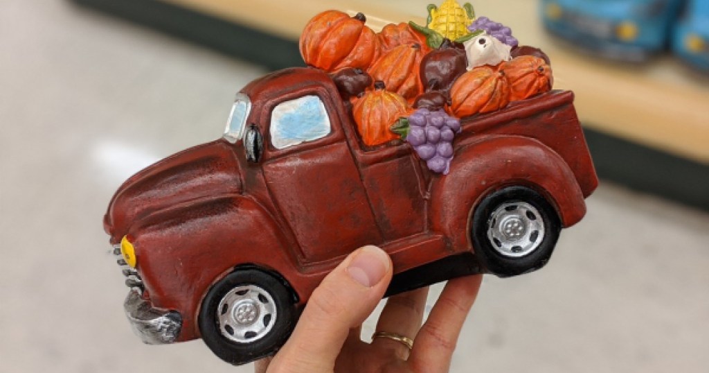 vintage red truck with pumpkins at hobby lobby
