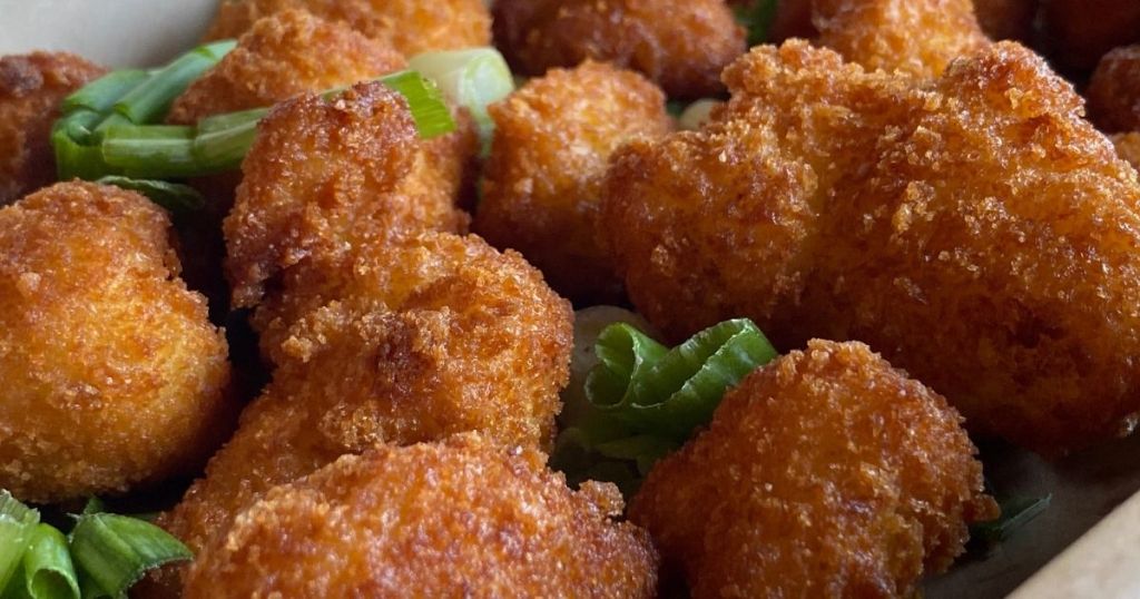 plate of cauliflower wings and green onions