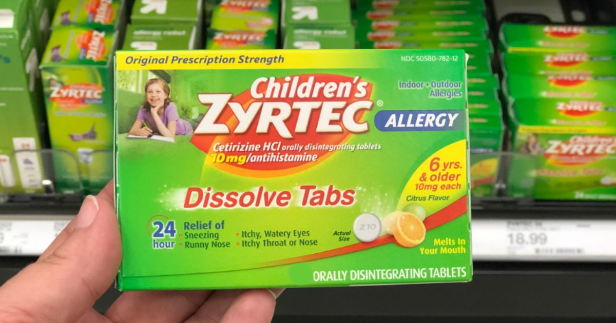 hand holding box of children's zyrtec dissolve tabs
