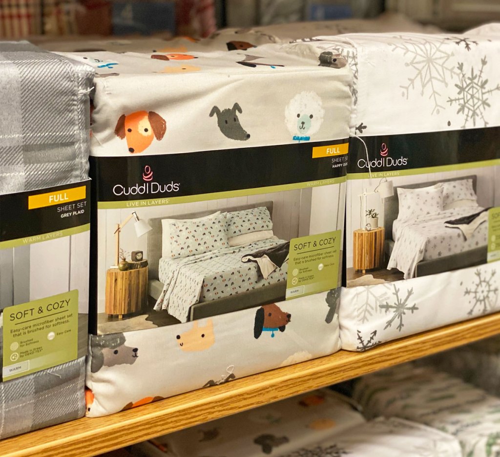 set of dog printed flannel sheet set on Kohl's display shelf